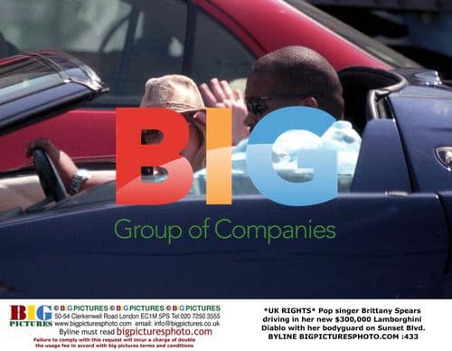 Britney Spears drives Lamborghini with bodyguard