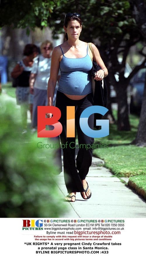 Pregnant Cindy Crawford takes prenatal yoga class
