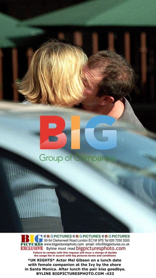 Mel Gibson on lunch date, kissing companion