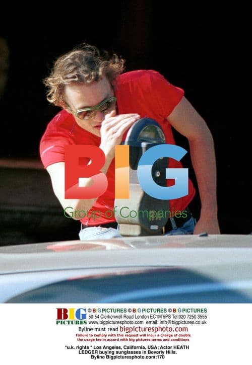 Heath Ledger shops for sunglasses in Beverly Hills