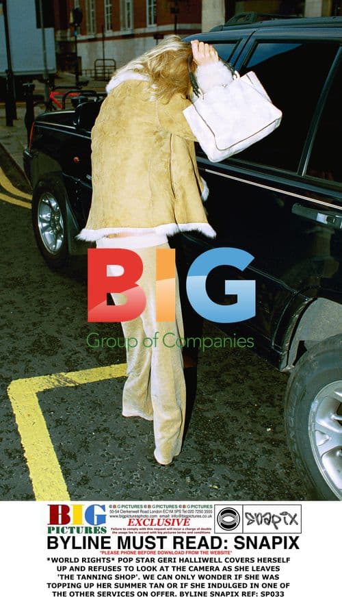 Geri Halliwell Covers Up at Tanning Shop