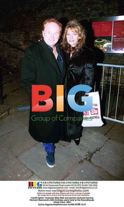 Mike Batt and partner at Richard Desmond's 50th birthday party