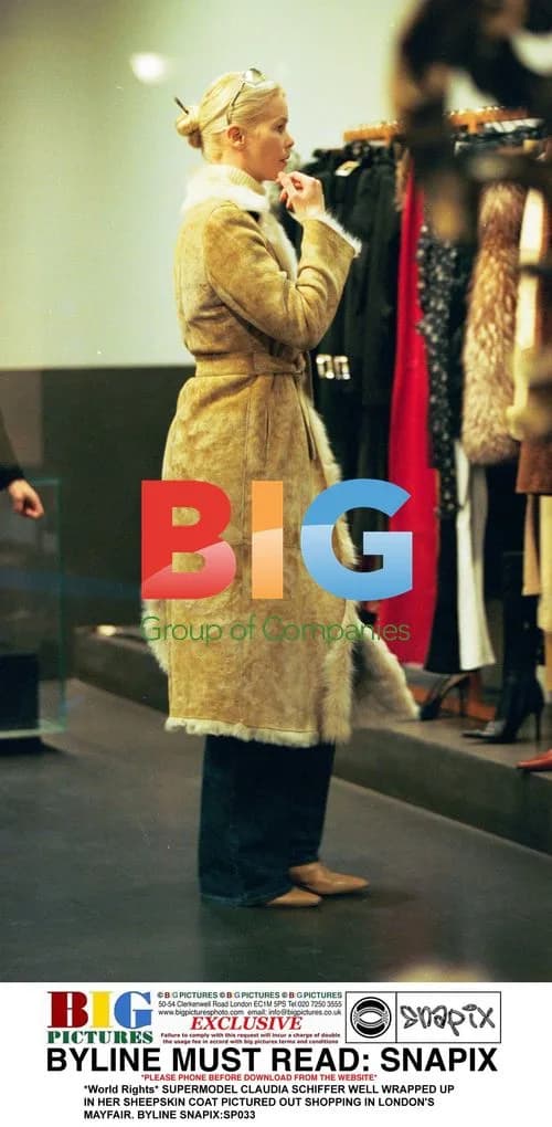 Claudia Schiffer Bundled Up Shopping in London