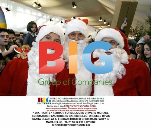 Schumacher and Barrichello as Santa at Ferrari Party