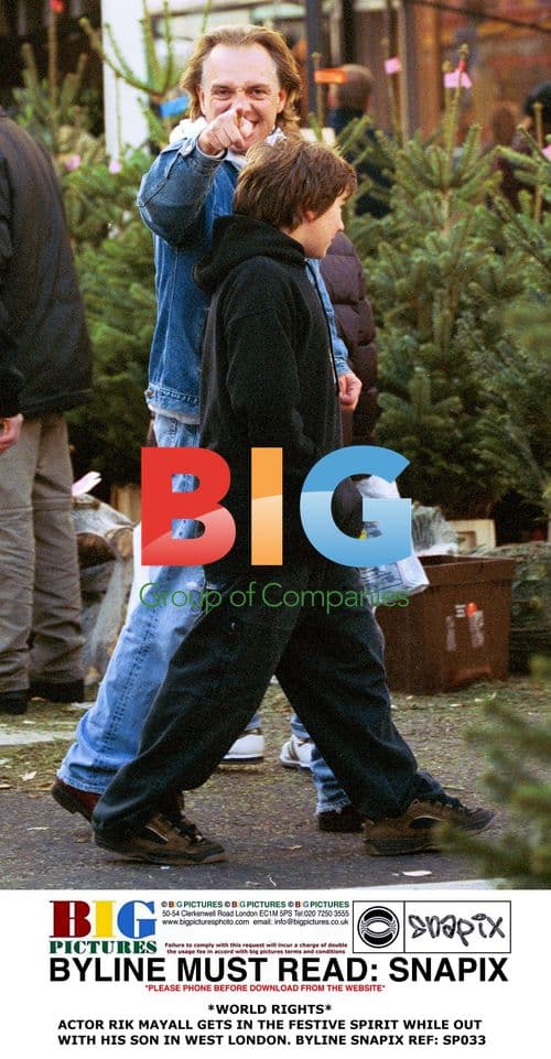 Rik Mayall Gets Festive with Son in West London