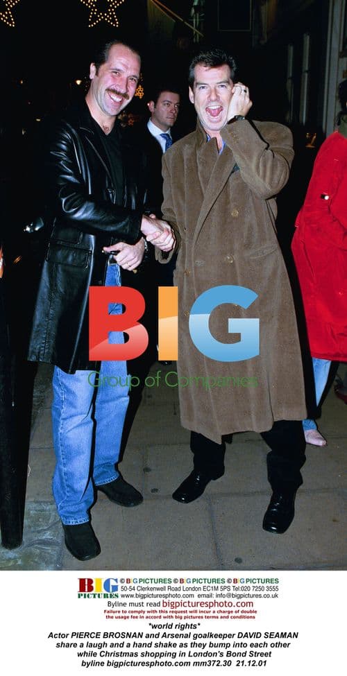 Pierce Brosnan and David Seaman Christmas shopping