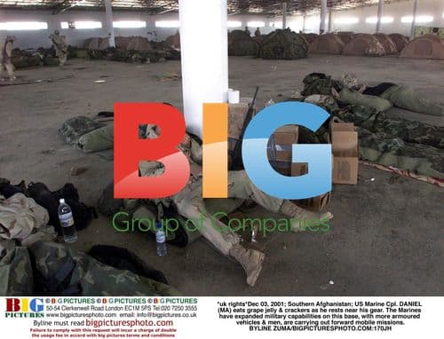 Marine Cpl. eats grape jelly in Afghanistan