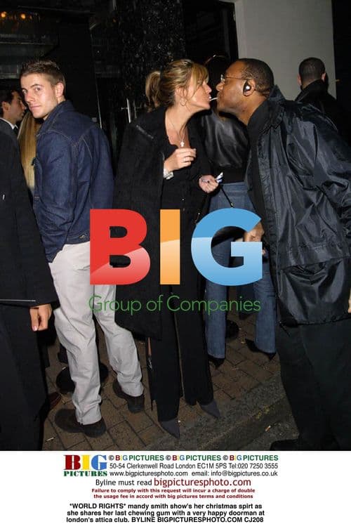 Mandy Smith spreads holiday cheer with doorman