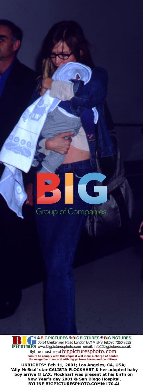 Calista Flockhart & adopted baby at LAX