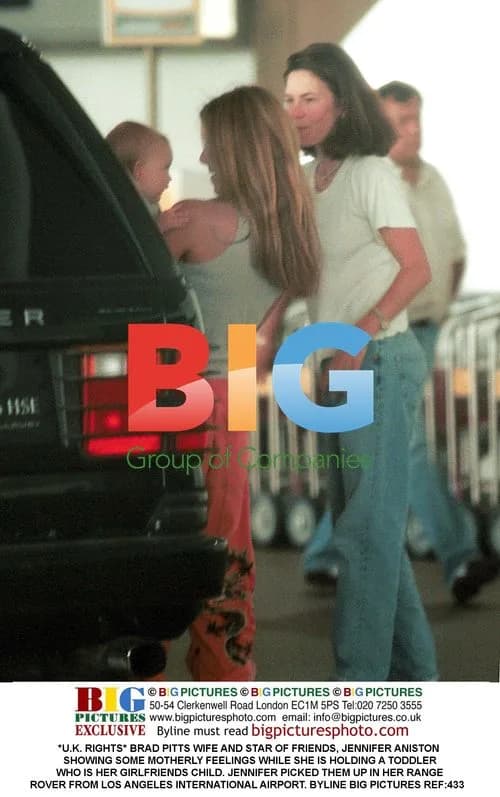 Jennifer Aniston with toddler after airport pickup