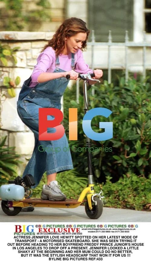Jennifer Love Hewitt on Motorized Skateboard
