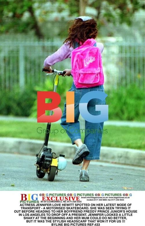 Jennifer Love Hewitt on Motorized Skateboard