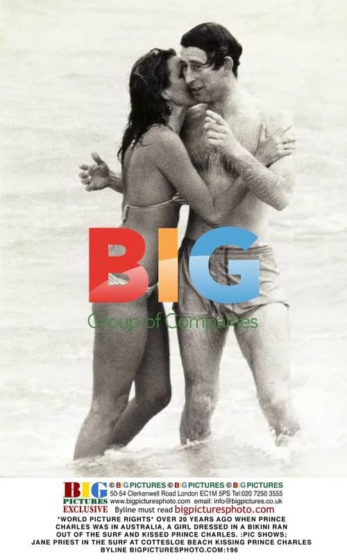 Prince Charles Kissed by Bikini-Clad Woman