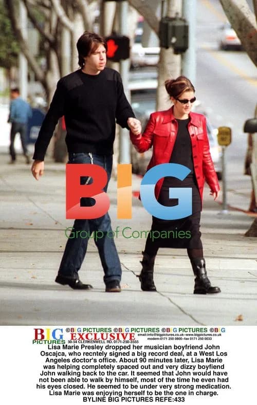 Lisa Marie Presley Helps Dizzy Boyfriend