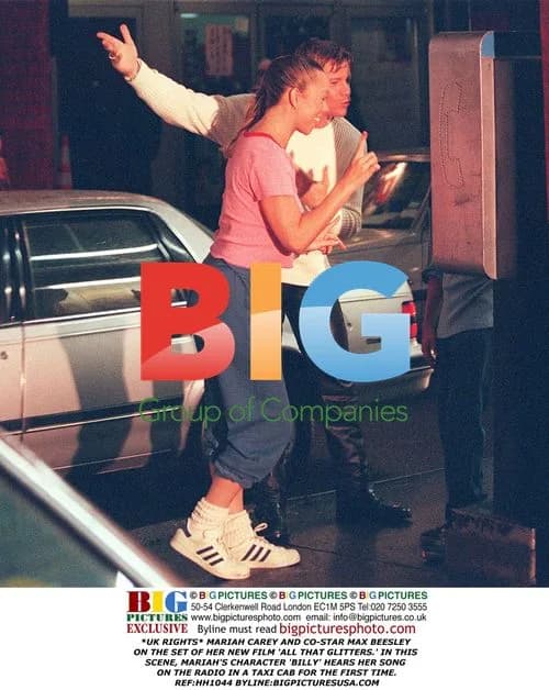 Mariah Carey and Max Beesley on set