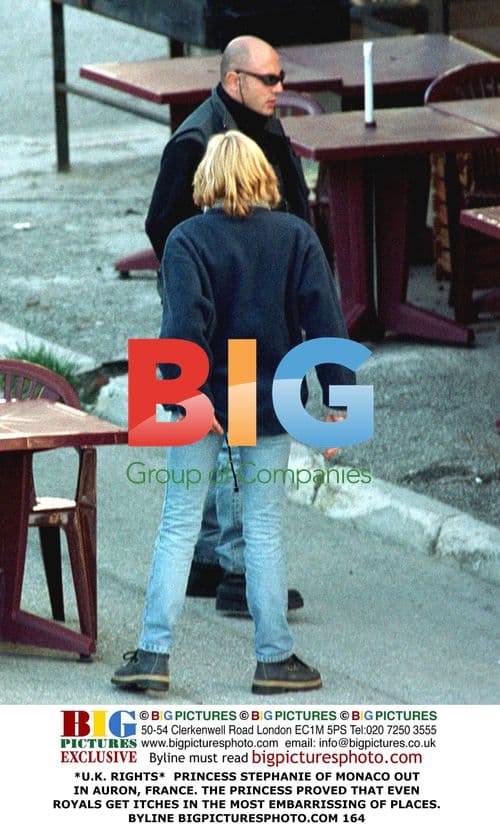 Princess Stephanie of Monaco caught scratching itch