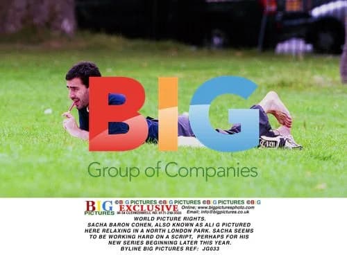 Sacha Baron Cohen Relaxing in Park