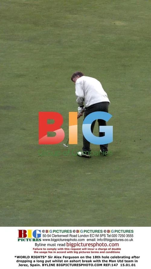 Sir Alex Ferguson celebrates golf putt in Jerez