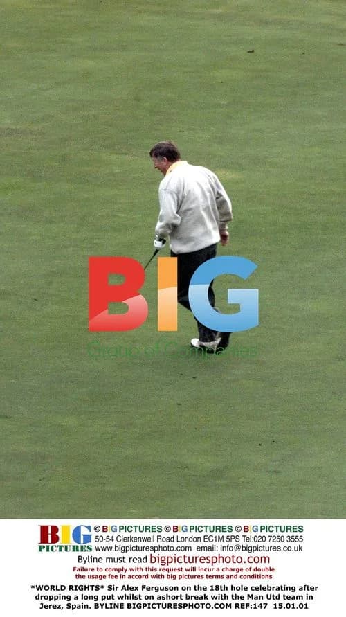 Sir Alex Ferguson celebrates golf putt in Jerez