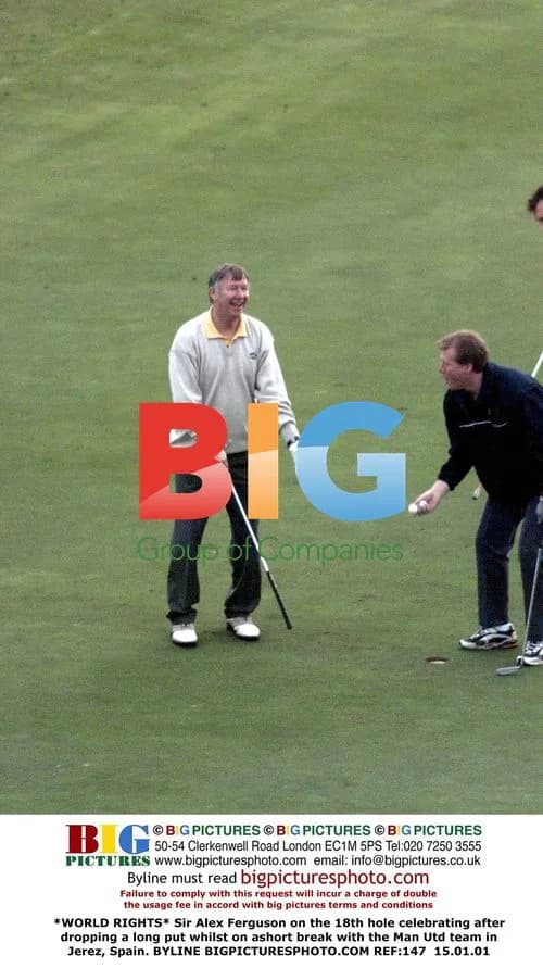 Sir Alex Ferguson celebrates golf putt in Jerez