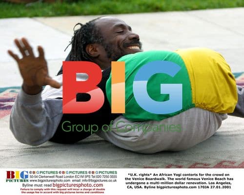 African Yogi Performs on Venice Boardwalk