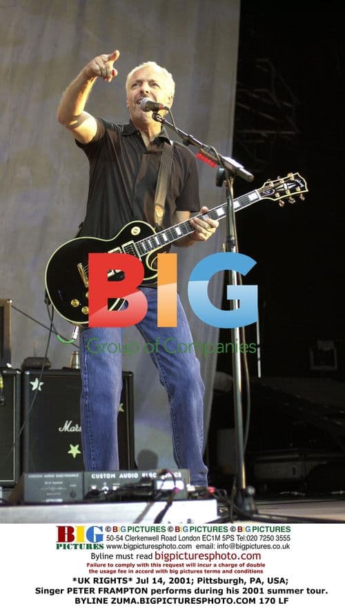 Singer PETER FRAMPTON on stage during 2001 summer tour
