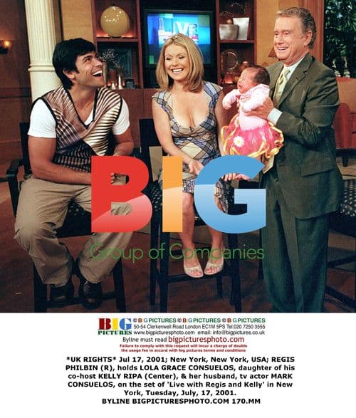 Regis Philbin holds Lola Grace Consuelos on 'Live with Regis and Kelly'