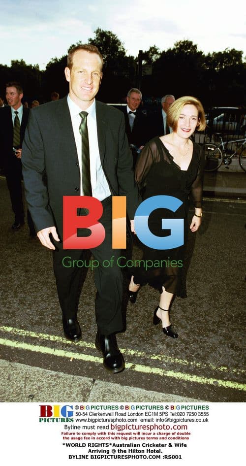 Australian Cricketer & Wife Arrive at Hilton Hotel