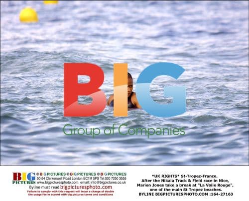 Marion Jones relaxing at St-Tropez beach