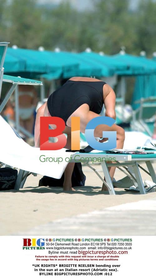 Brigitte Nielsen sunbathing in Italy