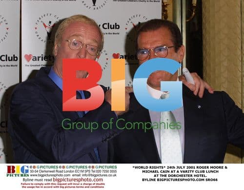 Roger Moore, Michael Caine, Joan Collins at Variety Club Lunch