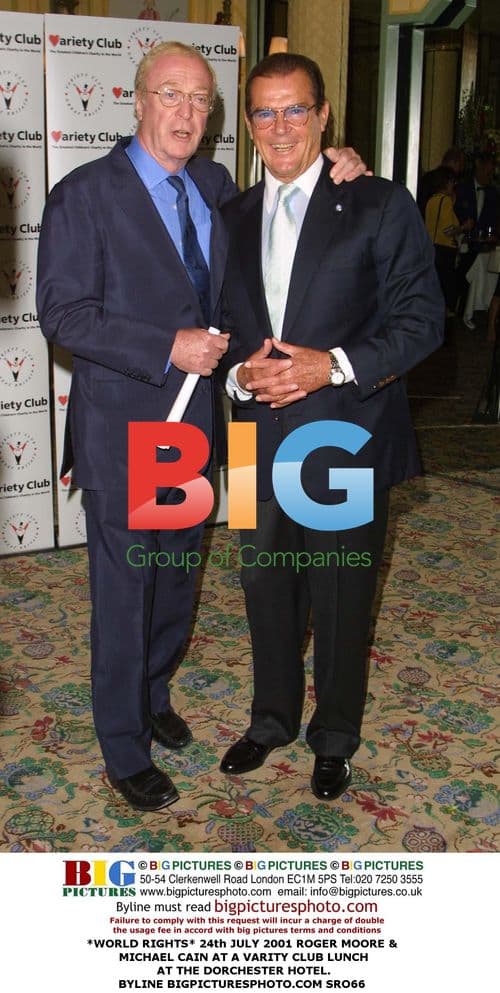 Roger Moore, Michael Caine & Joan Collins at Variety Club Lunch