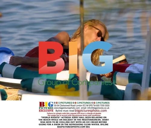 Jerry Hall relaxing on Mediterranean beach