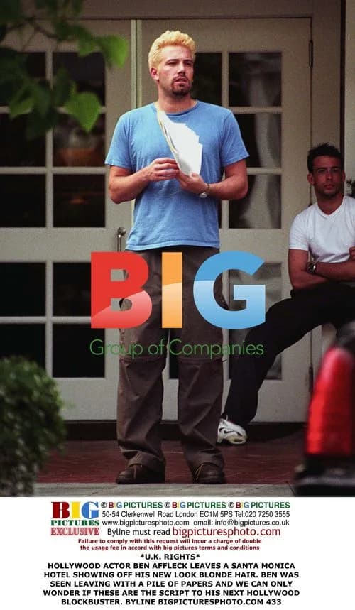Ben Affleck Leaves Hotel with Papers