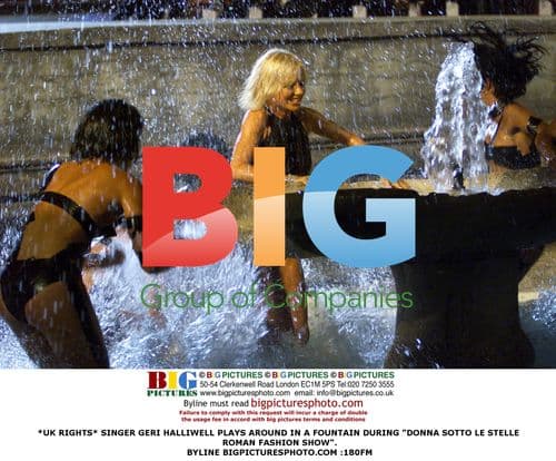 Geri Halliwell Frolicking in Fountain at Roman Fashion Show