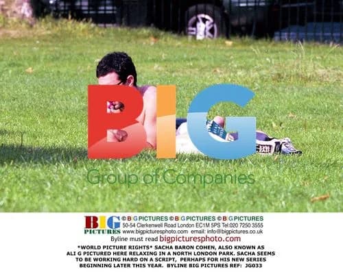 Sacha Baron Cohen relaxing in London park