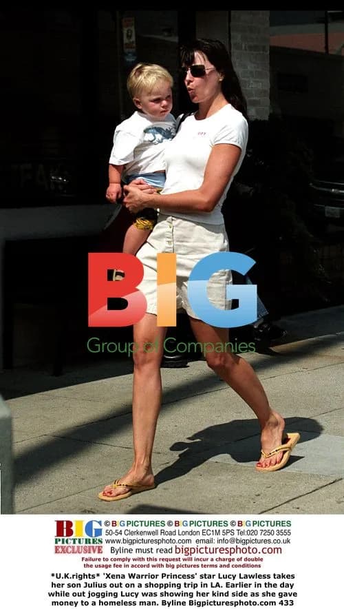Lucy Lawless takes son shopping in LA