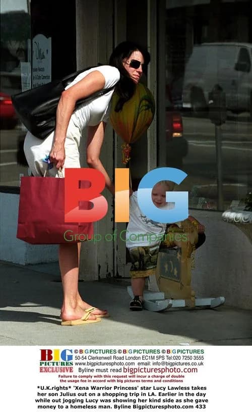 Lucy Lawless takes son shopping in LA