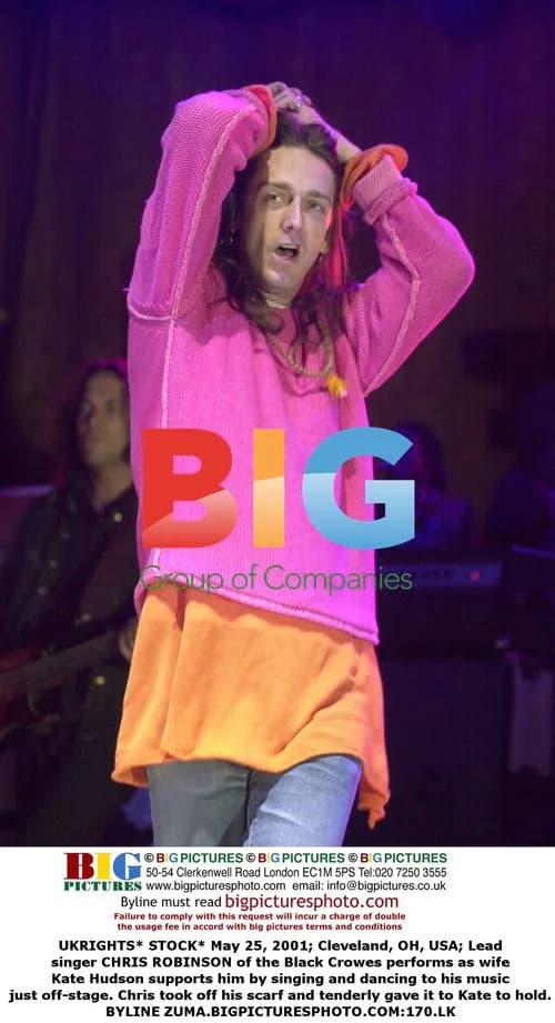 Chris Robinson of the Black Crowes performs, wife Kate Hudson supports