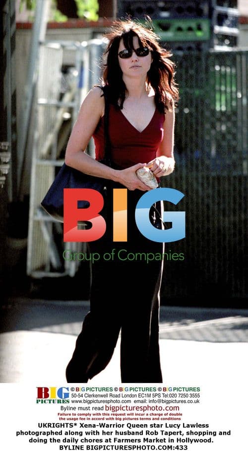 Lucy Lawless and husband Rob Tapert shopping at Farmers Market