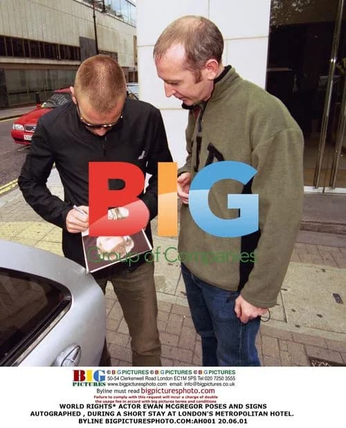 Ewan McGregor Poses and Signs Autographs