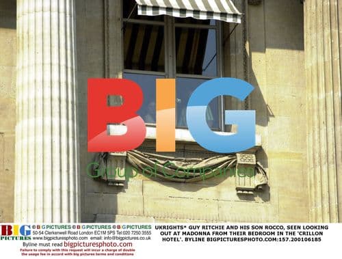 Guy Ritchie and son Rocco at hotel