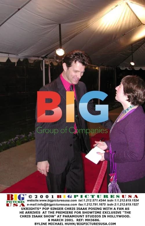 Chris Isaak Meets Fan at Premiere