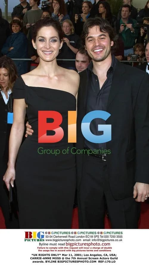 Carrie-Anne Moss & husband at SAG Awards