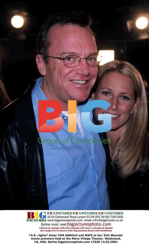 Tom Arnold and wife at 'Exit Wounds' premiere