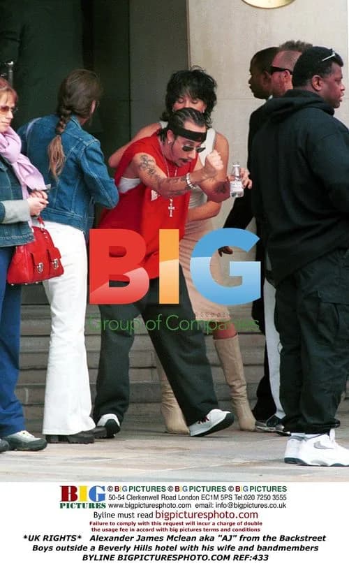Backstreet Boys' AJ Mclean with wife outside hotel