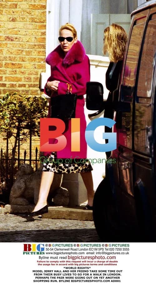 Jerry Hall takes walk with friend in London