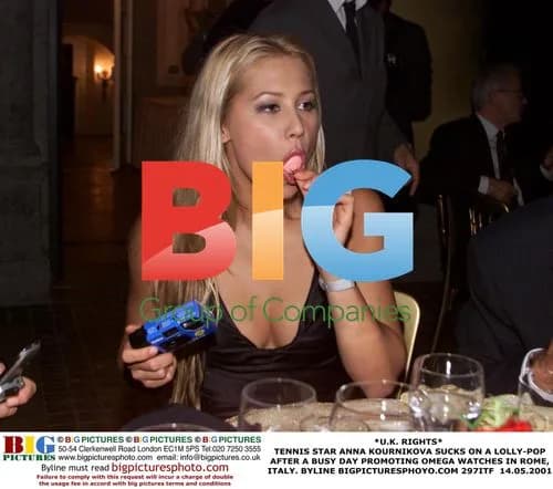 Anna Kournikova Enjoys Lollipop in Rome