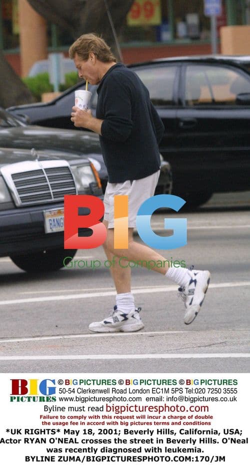 Ryan O'Neal Crosses Street in Beverly Hills