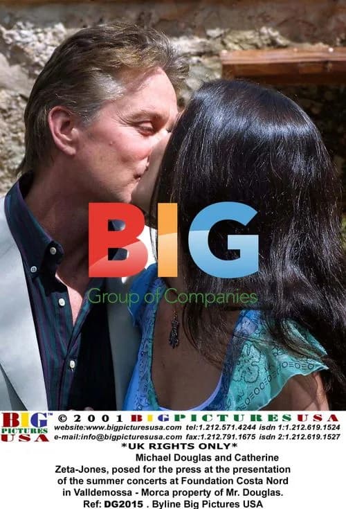 Michael Douglas and Catherine Zeta-Jones pose at concert